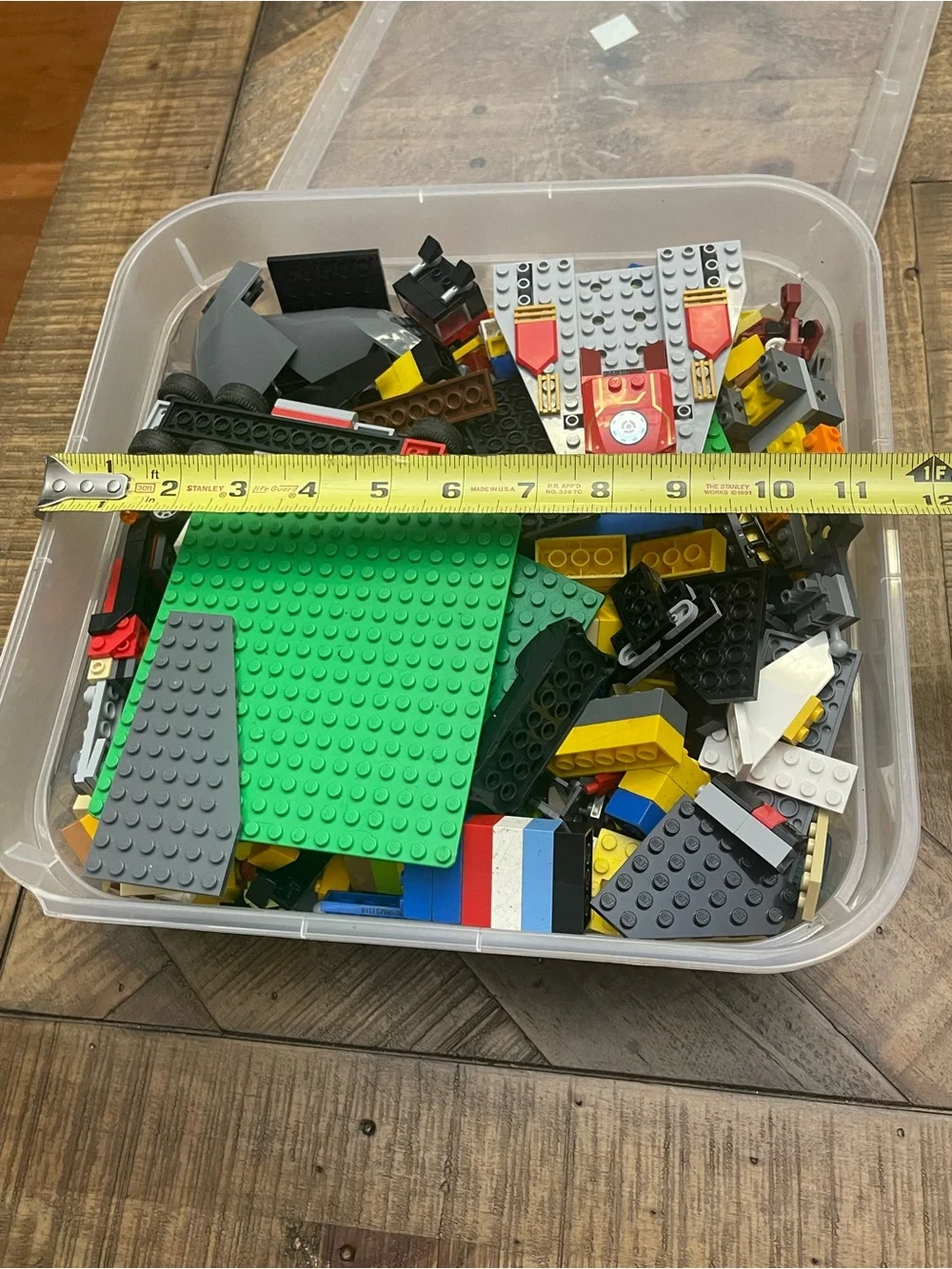 mixed assortment of LEGO brand bricks, plates, and specialty components